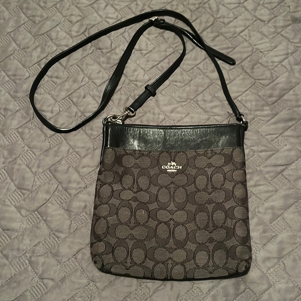 USED Coach cross body bag with coach signature print.